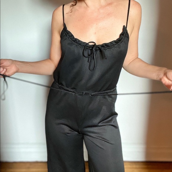 Vintage 70s black bell bottom jumpsuit/ playsuit. Sz sm. - Picture 3 of 9